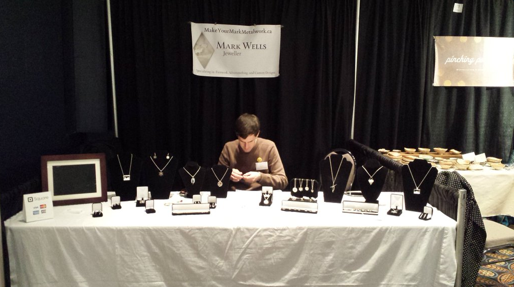 Newly juried artist Mark Wells at WinterGreen Fine Craft Market 2015.
