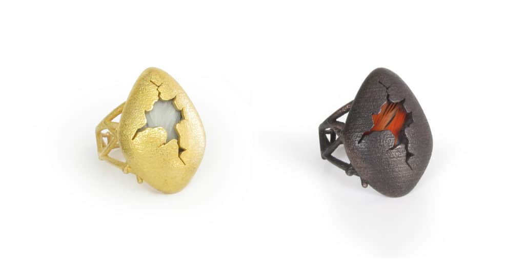 "Egg Rings" 2016, Steel and gold plated steel, feather; 3D printed process. $110.